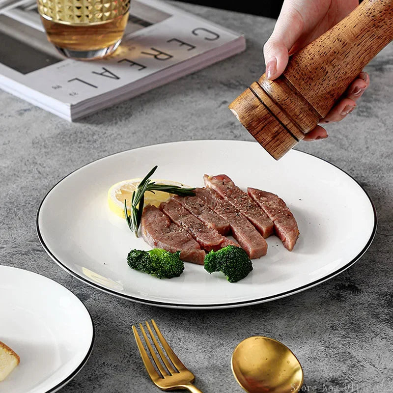 White Ceramic Plate with Black Rim – Minimalist Round Design